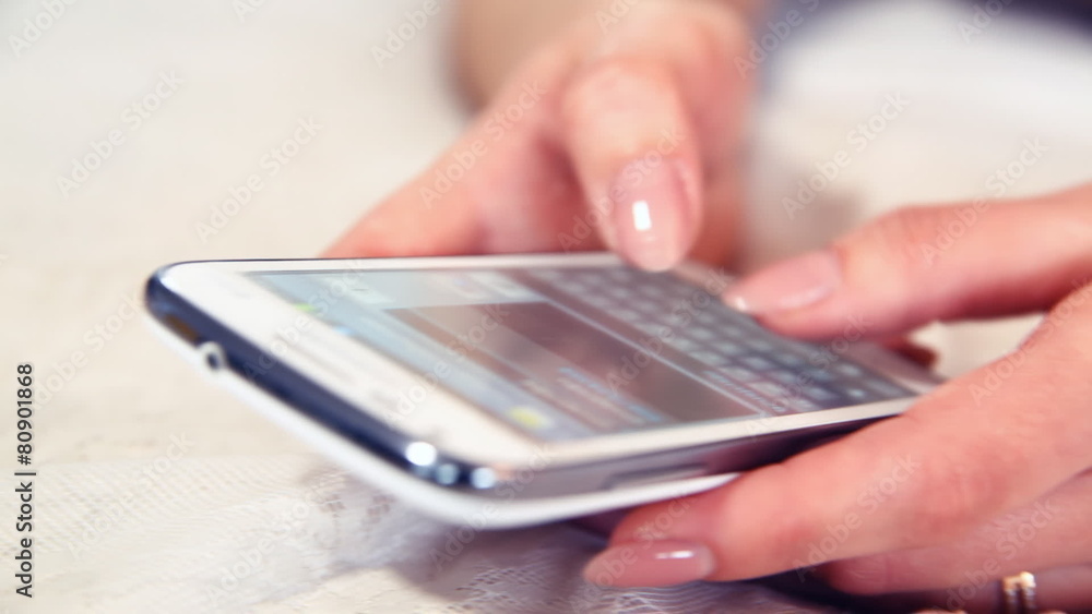 Close up of woman hands sending sms on smartphone Close up of woman hands sending sms on smartphone