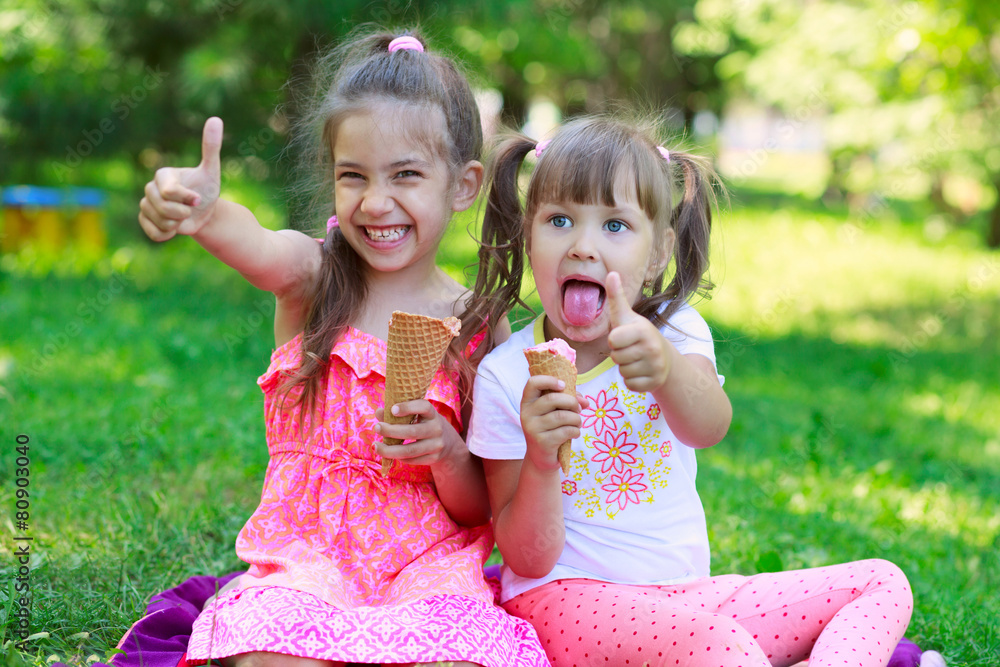 Girls kids sisters friends teasing eating ice cream Stock Photo Adobe