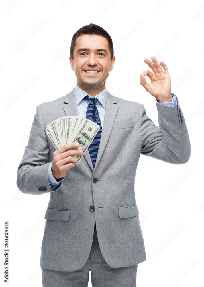 smiling businessman with american dollar money smiling businessman with american dollar money