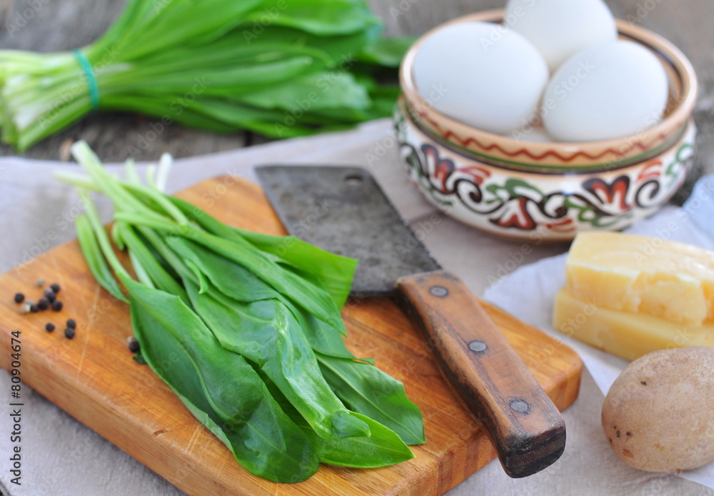 Green chopped eggs salad with potato, ramson and parmesan cheese Green chopped eggs salad with potato, ramson and parmesan cheese