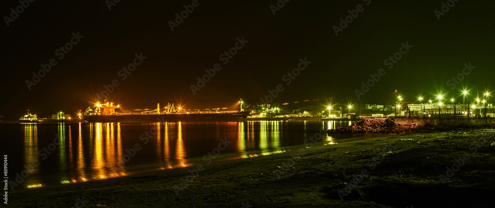 Panorama of sea port Burgas. Ships sand and reflections light.