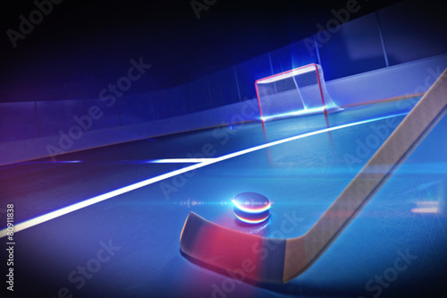 Photography Hockey Stick and Puck on the Ice Rink