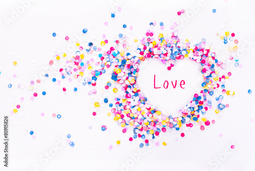 Heart shape in confetti with sample text, love