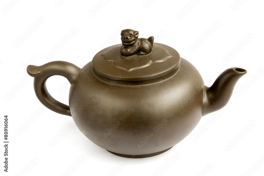 Clay teapot isolated on white background Clay teapot isolated on white background
