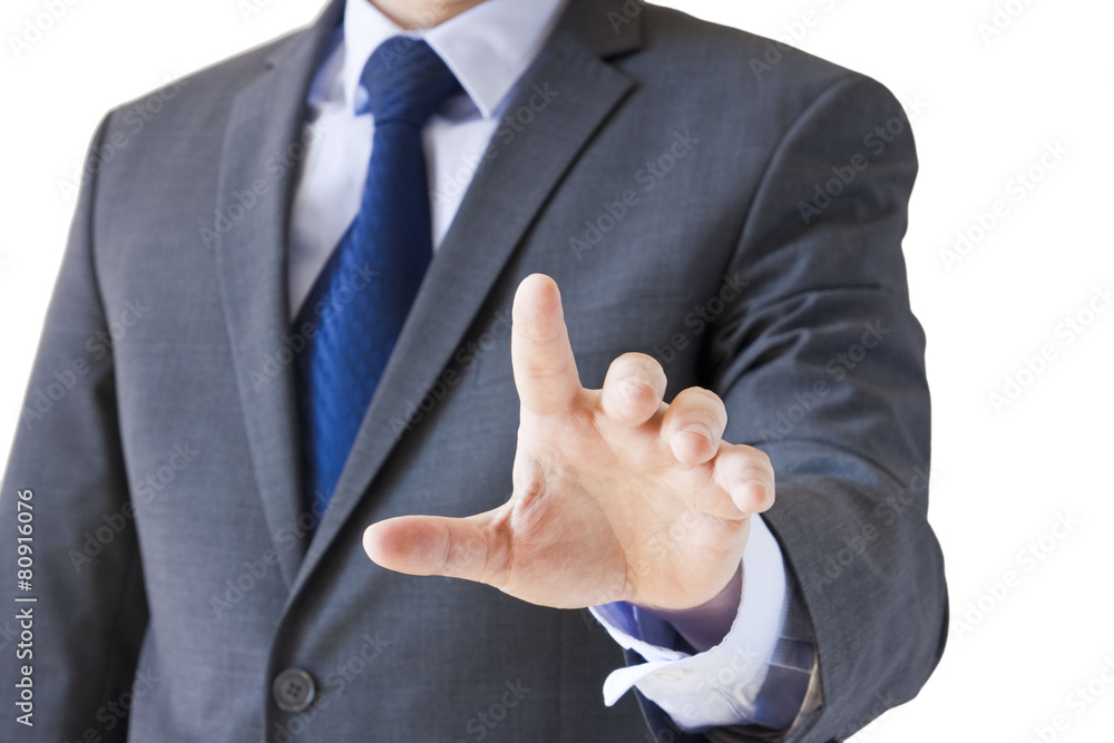 Businessman pointing at something isolated on white Businessman pointing at something isolated on white
