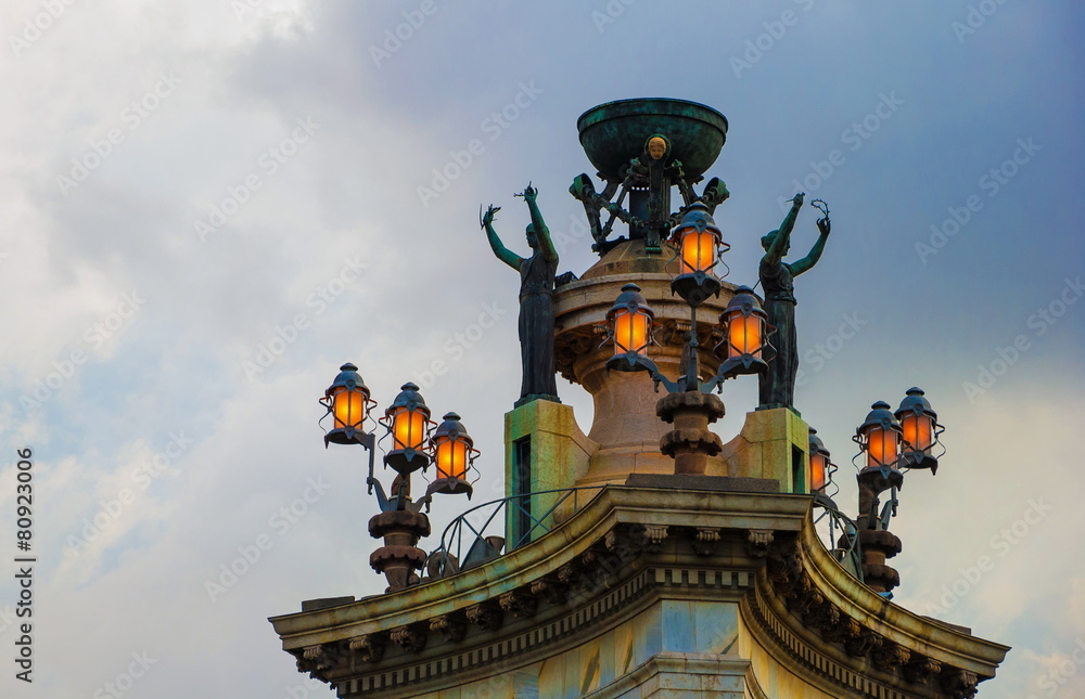 Sculptures with lanterns at Plaza of Spain in Barcelona