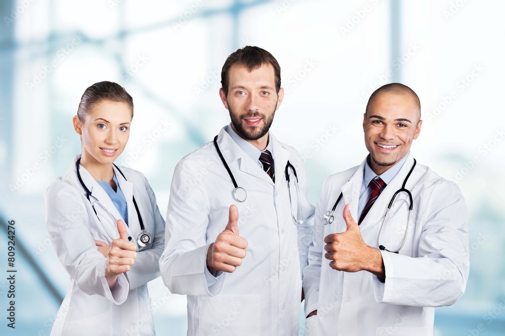 Doctor. Portrait of happy doctors standing in a row Doctor. Portrait of happy doctors standing in a row