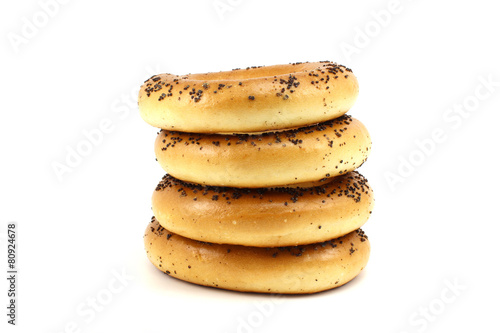 Several poppy bagels stacked