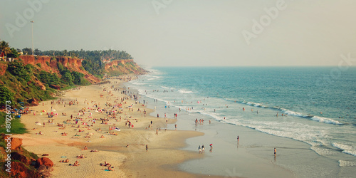 Tropical beach and peaceful ocean - vintage filter. Varkala. photo