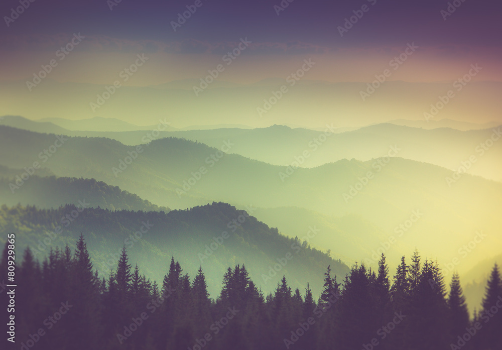 Layers of mountain and haze in the valleys.