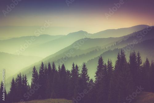 Fototapeta Naklejka Na Ścianę i Meble -  Layers of mountain and haze in the valleys.