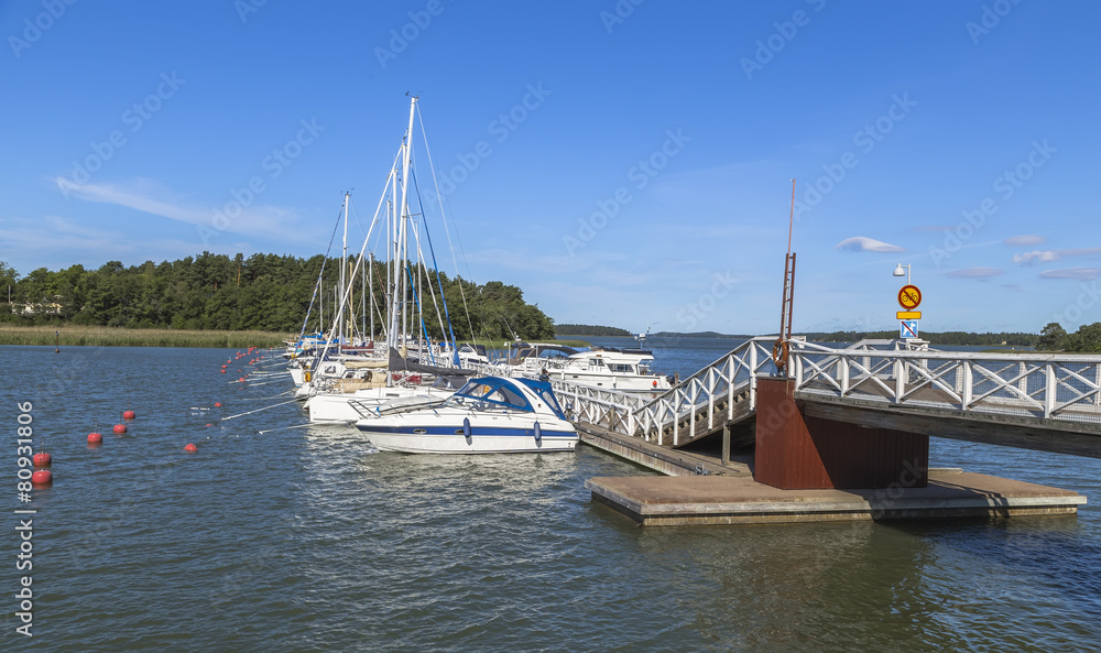 Fototapeta premium White yachts and motor boats