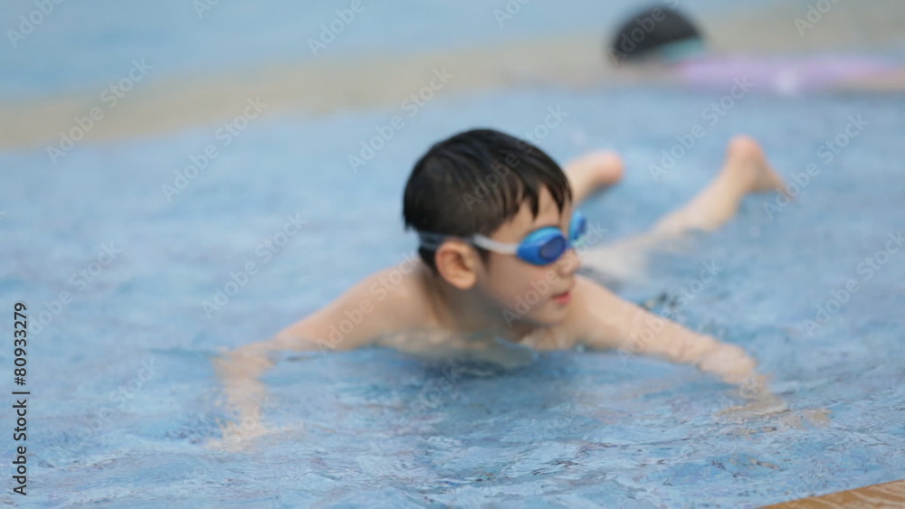 Little Asian Child playing in Aqua park . Little Asian Child playing in Aqua park .