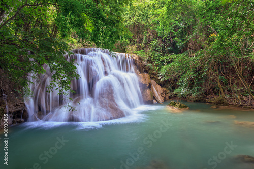 tropical waterfall in Deep forest © Noppasinw