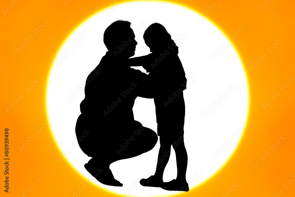 Silhouette o father kiss his son