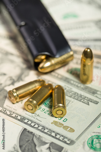 bullet on US dollar banknotes
