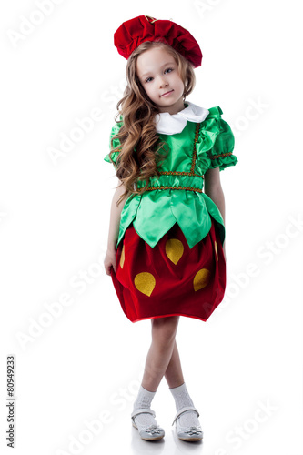 Cute little girl posing in strawberries costume