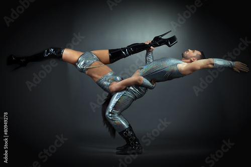 Flexible athletic dancers posing at camera © Wisky