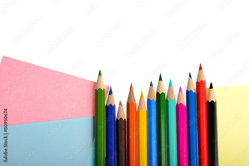 Fototapeta premium Multicolored paper and pencils isolated on white background