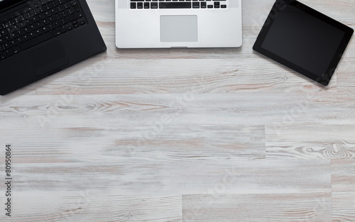 Wooden desk with many electronic devises