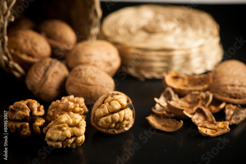 Wallnuts on a table in small baskets