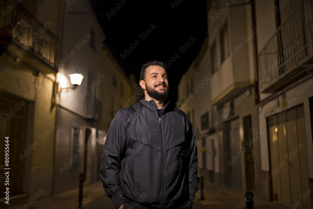 Outdoors night hipster in tracksuit Outdoors night hipster in tracksuit