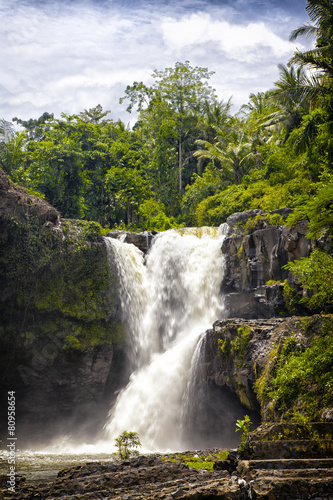 picturesque Tegenungan falls in tropics on the island of Bali