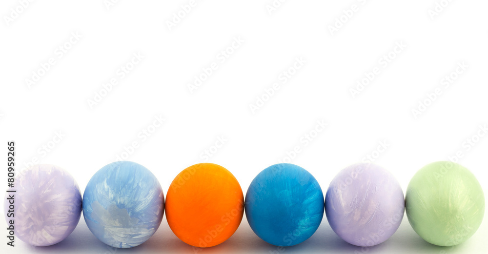 Row colorful Easter painted eggs isolated on white background Row colorful Easter painted eggs isolated on white background