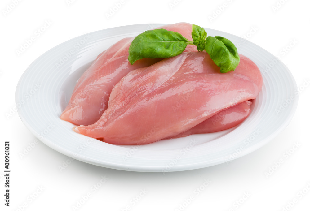 Raw fresh chicken fillet on white plate. With clipping path. Raw fresh chicken fillet on white plate. With clipping path.