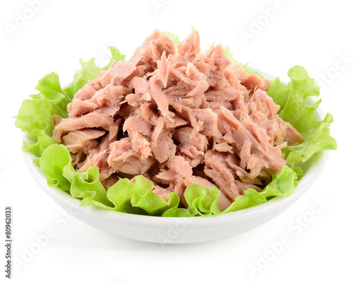 Canned tuna with green salad on white photo