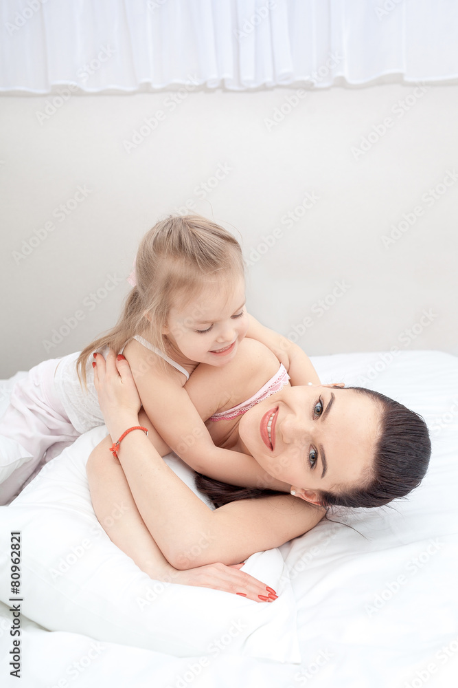Mother and daughter in bed Mother and daughter in bed