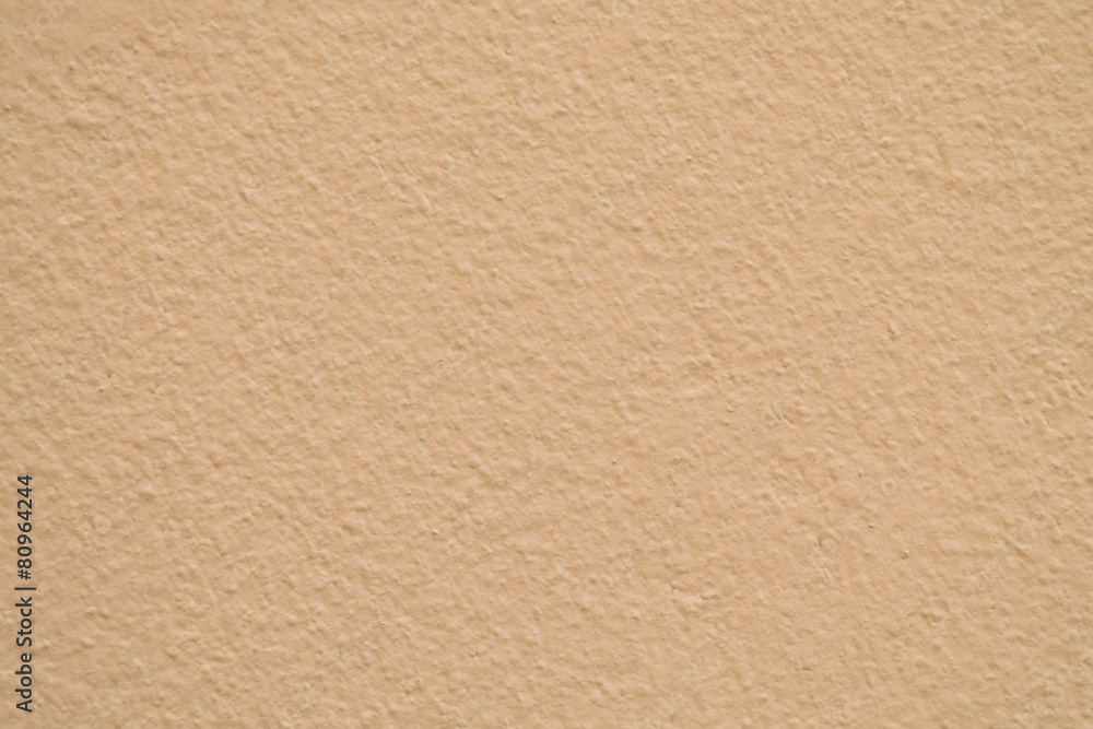 Gold cement wall texture used as background Gold cement wall texture used as background