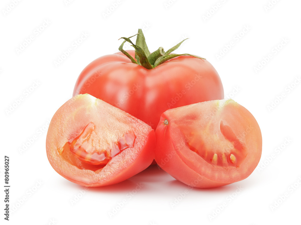 one ripe red tomato with segments isolated on white one ripe red tomato with segments isolated on white