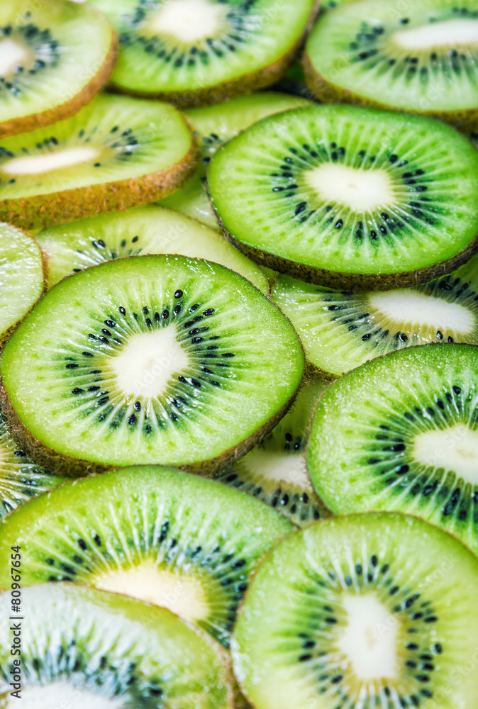 background with citrus-fruit of Kiwi slices background with citrus-fruit of Kiwi slices