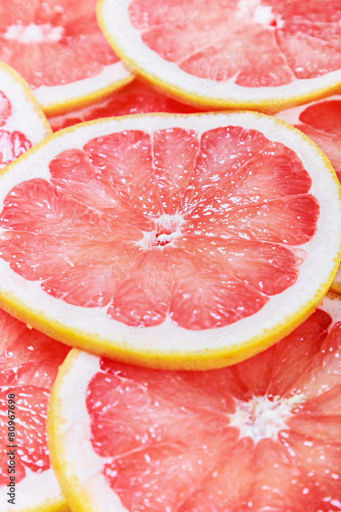 background with citrus-fruit of grapefruit slices background with citrus-fruit of grapefruit slices