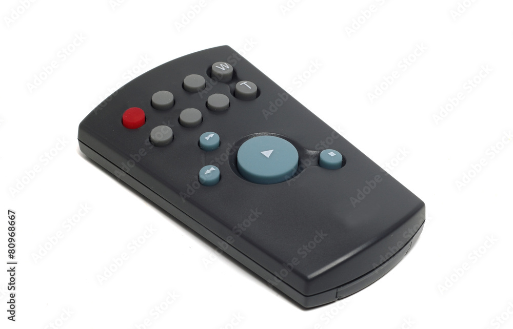 miniature remote controls on a white background miniature remote controls on a white background
