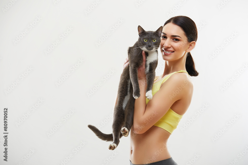 Obraz premium Woman holding cute black cat