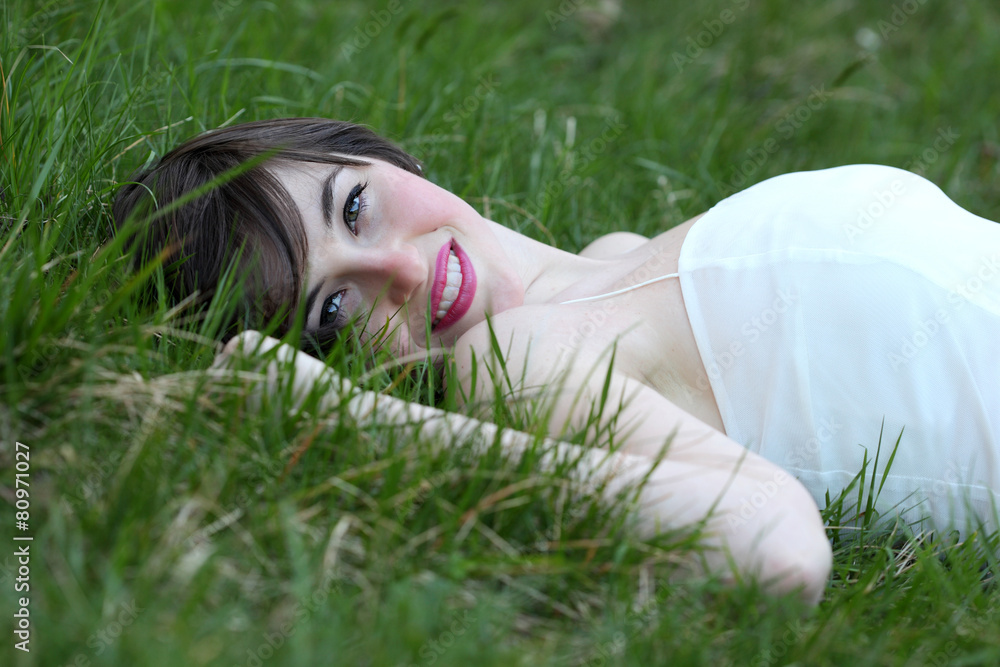 Happy cute girl on green field Happy cute girl on green field