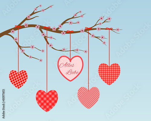 branch with blossoms and red hearts