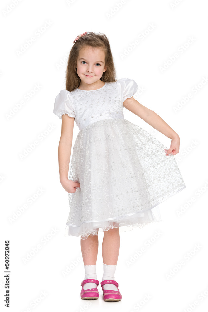 Pretty little girl in the white dress