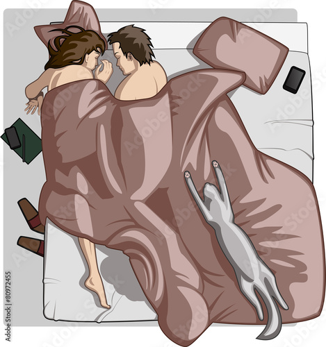 Couple sleeping on a sunny morning with cat on the bed
