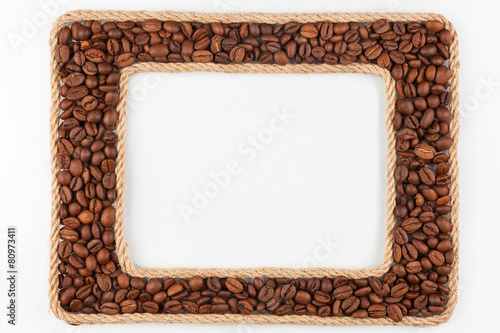 Two frames made of the rope with coffee beans on a white backgr