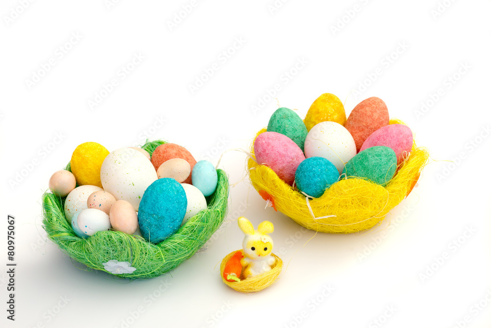 Happy Easter: colored eggs and a cute bunny Happy Easter: colored eggs and a cute bunny