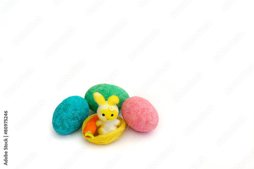 Happy Easter: colored eggs and a cute bunny