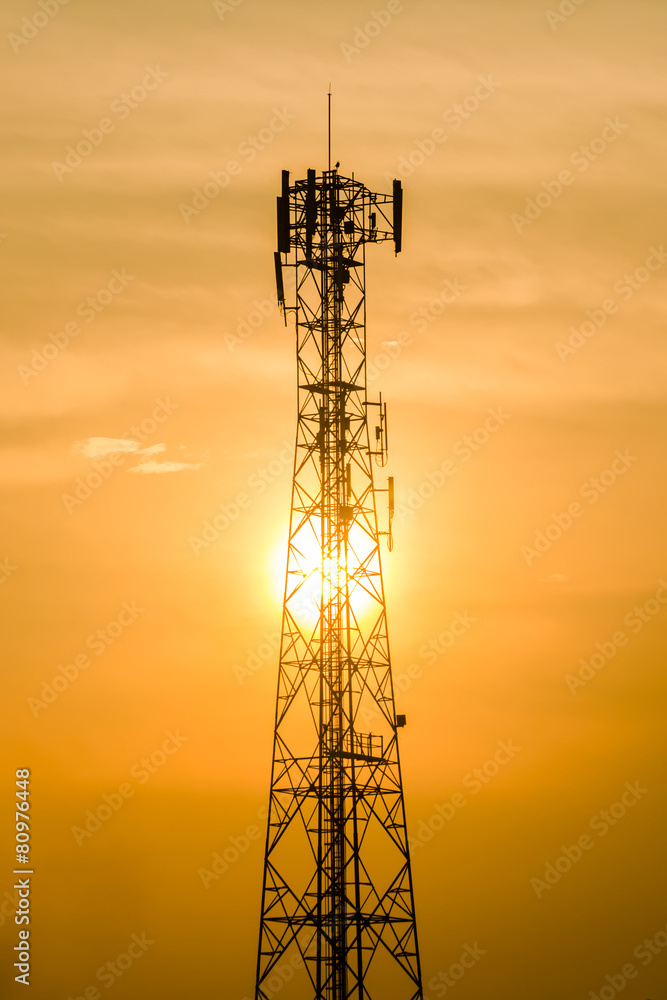 Communication tower on sunset background
