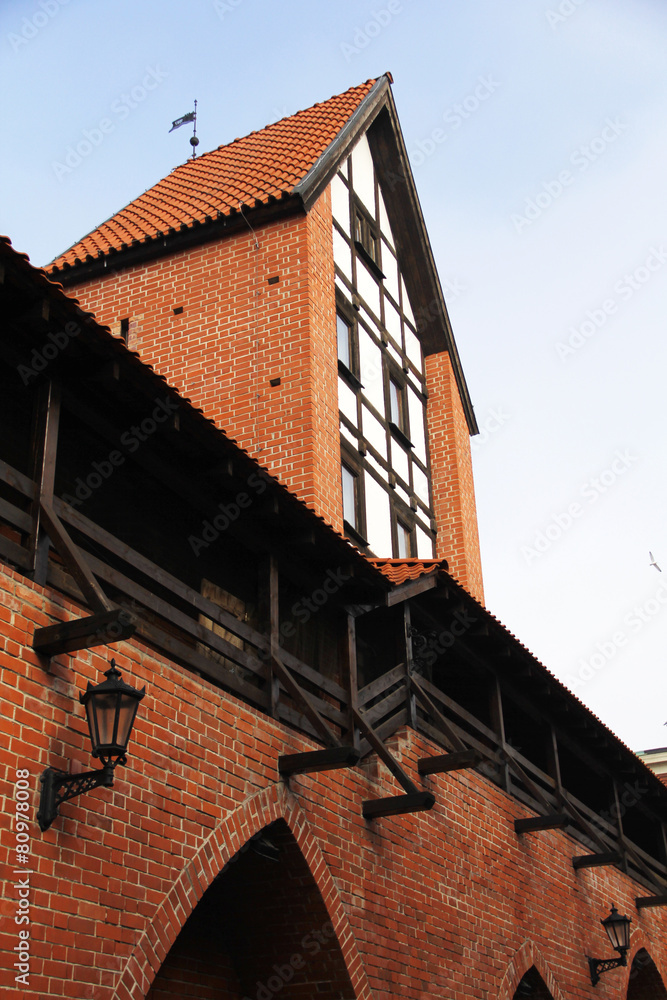 Red brick wall and tower in Old Riga
