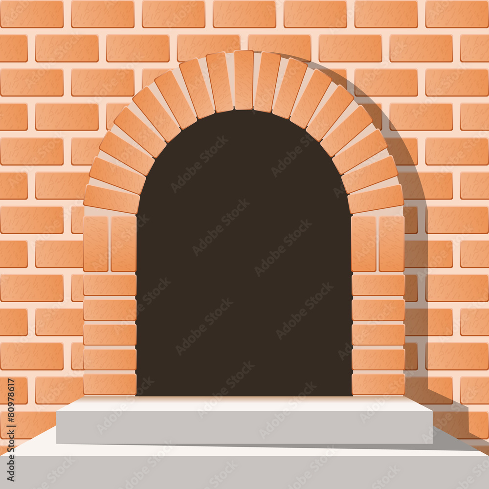 Arched medieval door in a brick wall with stairs