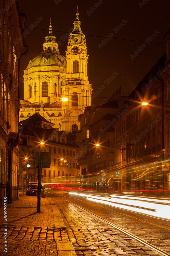 Prague street with Saint Nicolas church