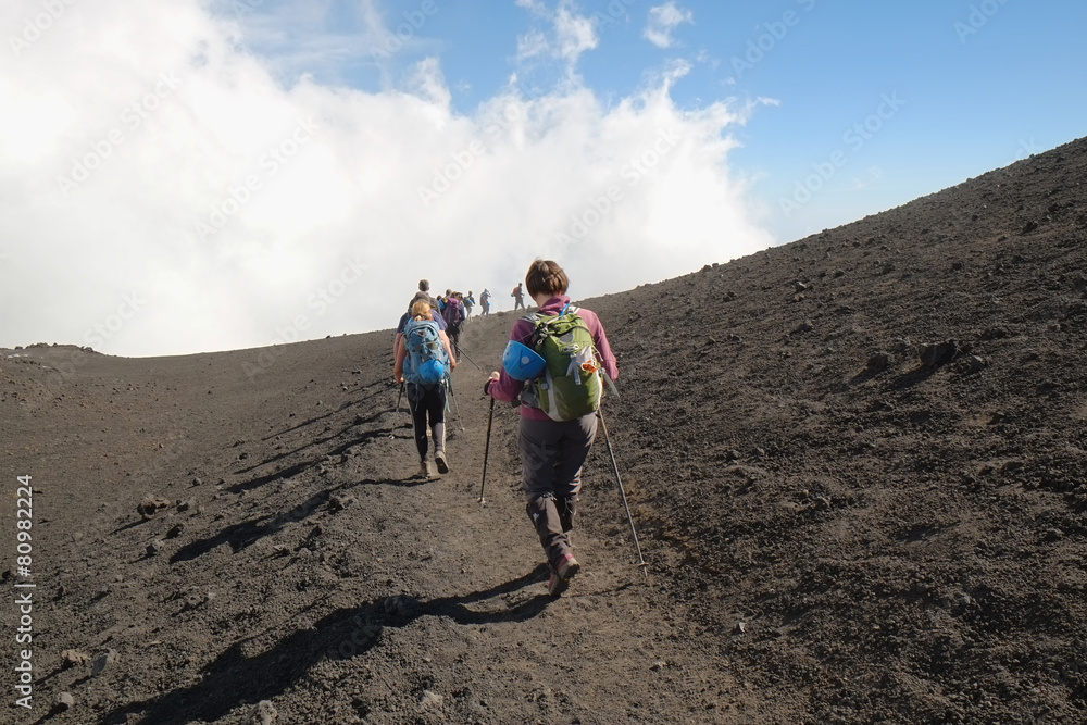 Hikers Going Down The Summit Etna Crater, Sicily