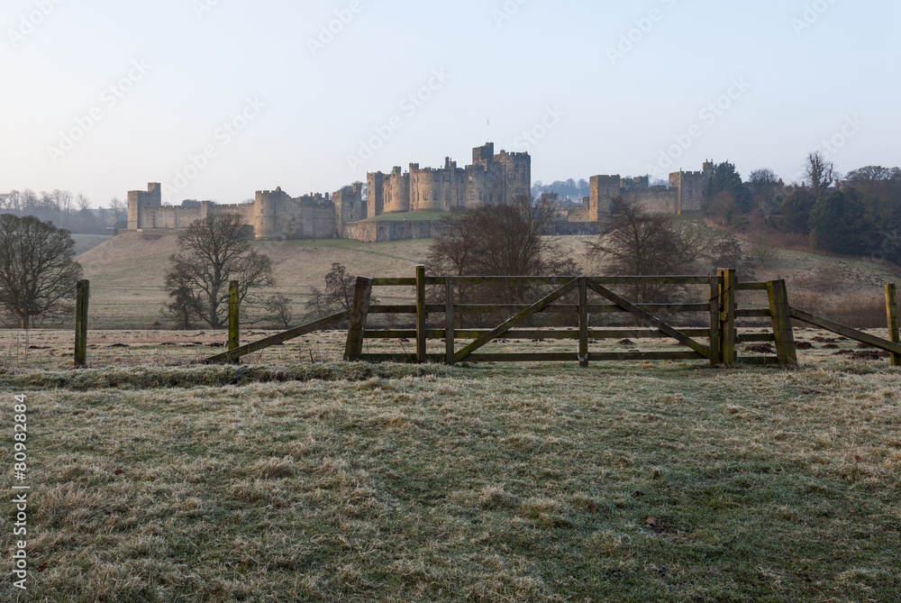 Alniwick Castle, Northumberland, England. At Dawn in light mist.